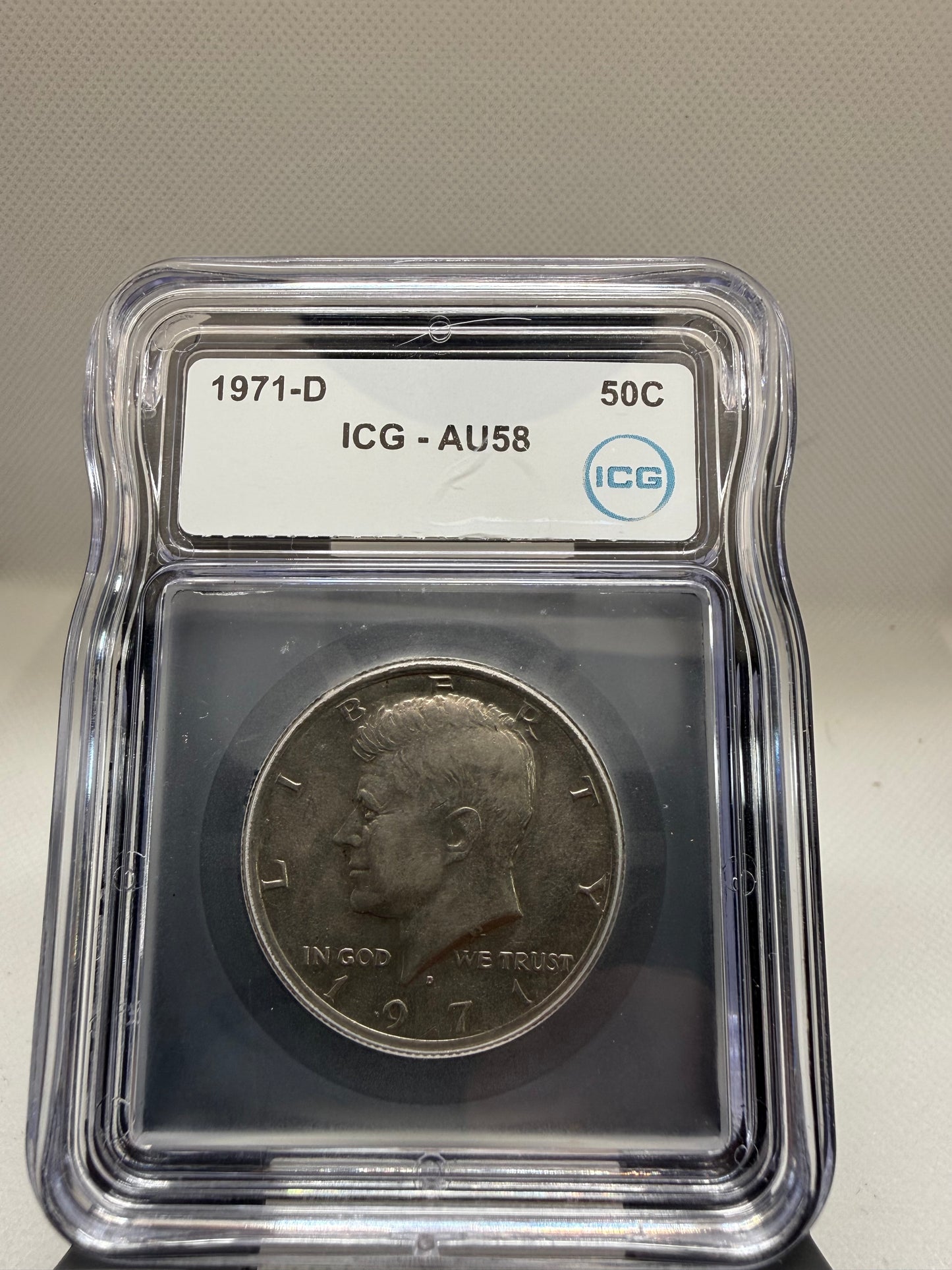 1971 ICG AU58 Kennedy half